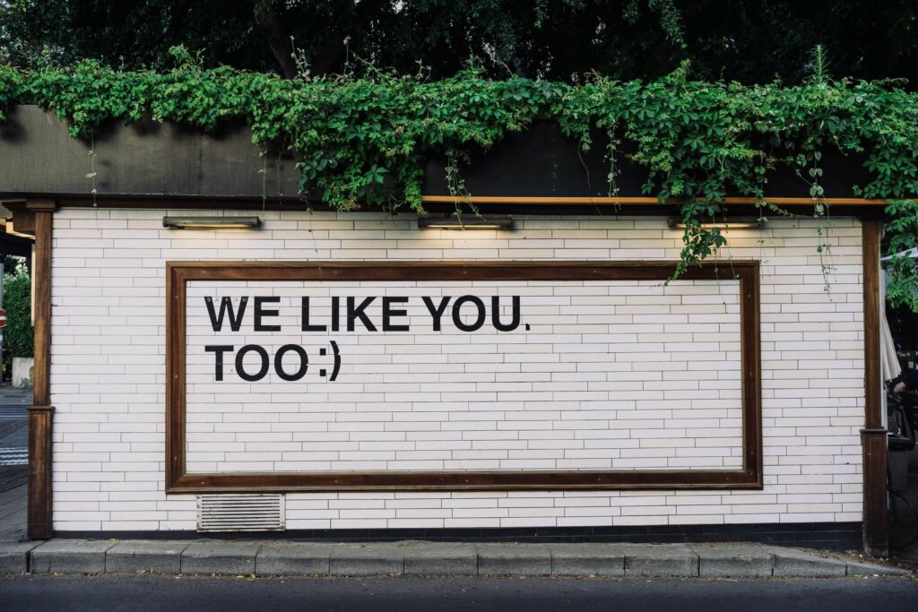 Alida Miranda-Wolff, The Ultimate Guide to Structuring a 90-Day Onboarding Plan article image, "We Like You, Too :)" tile mural