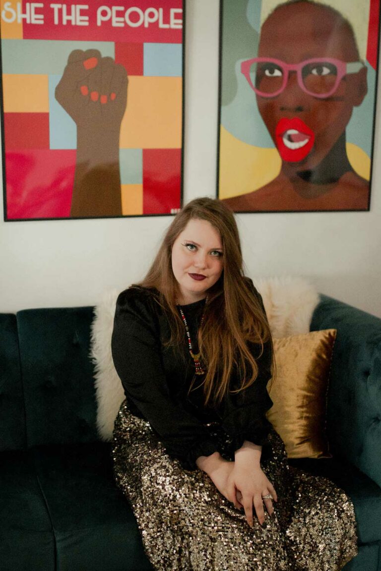 alida miranda-wolff, book author, image of alida on a sofa at her office